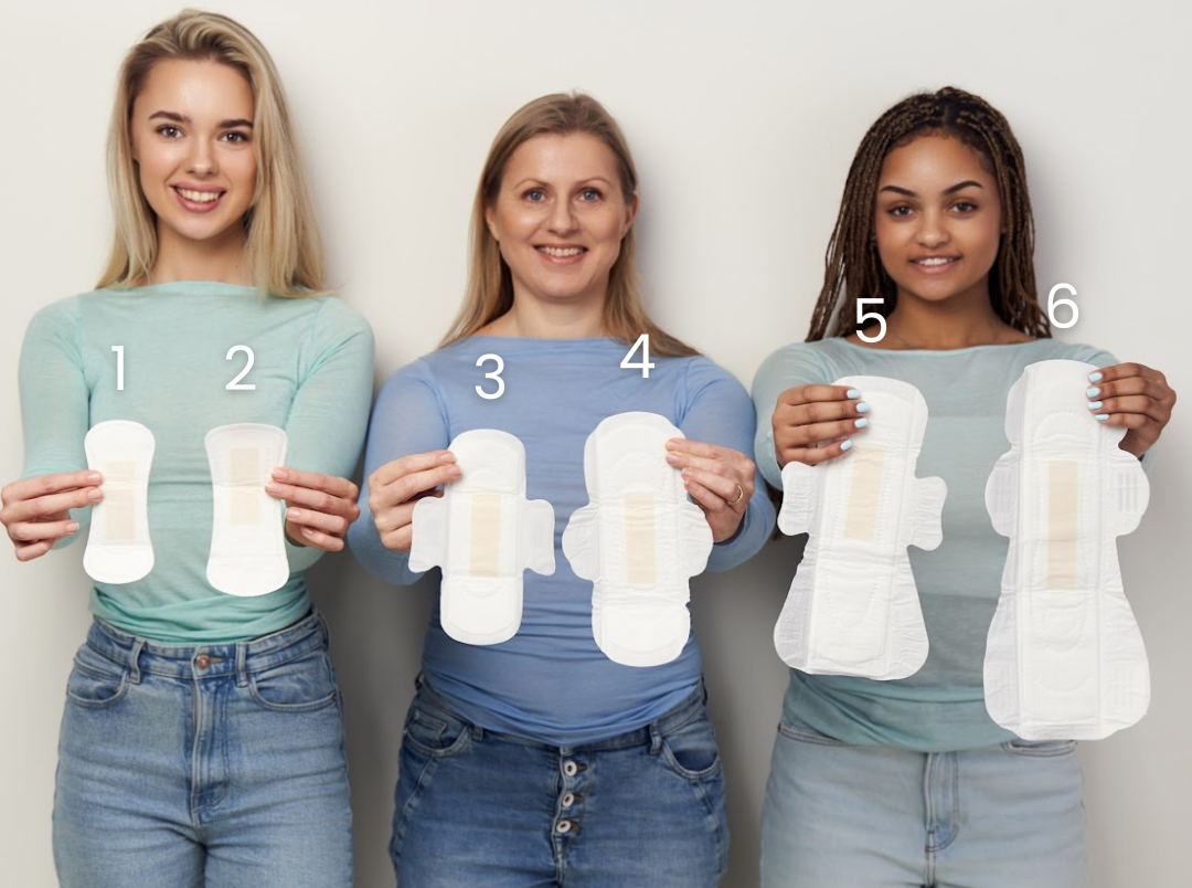 Women holding Gentle Day different size pads